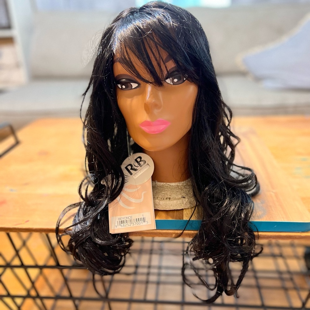 Black 22” synthetic fiber hand tied wig